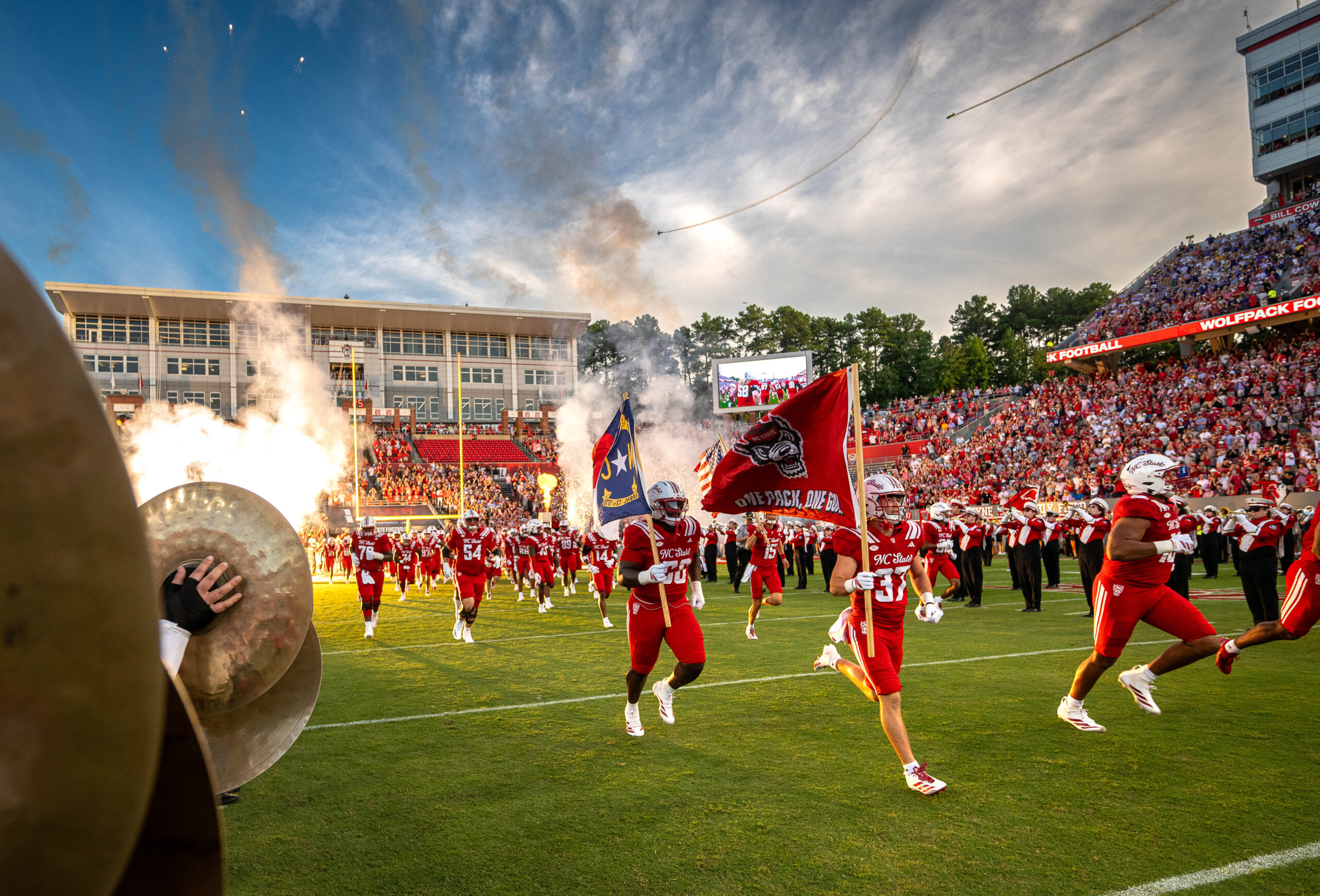 Fans cheer on NC State football versus ECU, August, 2025 at Carter Finley Stadium. Photo by Marc Hall